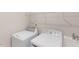 Well-equipped laundry room with modern washer and dryer, maximizing convenience at 2337 Bay Minette Sta # 553, Apex, NC 27502