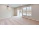 Finished basement with carpet, large windows, and sliding glass door at 2370 Bay Minette Sta # 697, Apex, NC 27502