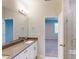 Bright bathroom with modern vanity and mirror, conveniently located near the bedroom and shower at 2370 Bay Minette Sta # 697, Apex, NC 27502