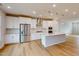 Modern kitchen with stainless steel appliances and white cabinets at 2370 Bay Minette Sta # 697, Apex, NC 27502
