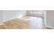 Bright living room with hardwood floors and large windows at 2370 Bay Minette Sta # 697, Apex, NC 27502