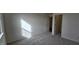 Neutral bedroom with plush carpeting, closet, and ample natural light at 566 John Stark Dr, Fuquay Varina, NC 27526