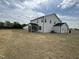 Expansive backyard featuring lush lawn, screened porch, and plenty of space at 57 Bering Cir, Angier, NC 27501