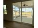 Screened porch providing an outdoor space with views of the surrounding yard at 57 Bering Cir, Angier, NC 27501