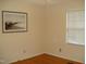 Empty bedroom with natural light from window and picture hanging on the wall at 301 Briarcliff Dr, Dunn, NC 28334