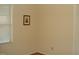 Bedroom with light walls and a window with blinds at 301 Briarcliff Dr, Dunn, NC 28334