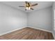 Cozy bedroom with neutral paint and flooring at 5554 Lake Vista Ct, Rocky Mount, NC 27803
