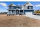 Charming two-story home with a welcoming front porch and attached garage on a large lot at 5554 Lake Vista Ct, Rocky Mount, NC 27803