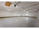 Expansive garage area with clean, white walls and high ceilings for ample storage at 5554 Lake Vista Ct, Rocky Mount, NC 27803