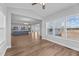 Open-concept living space with wood floors, connecting the dining area to the kitchen at 5554 Lake Vista Ct, Rocky Mount, NC 27803