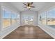 Bright sunroom with many windows providing natural light and outdoor views at 5554 Lake Vista Ct, Rocky Mount, NC 27803