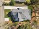 Top-down aerial view of a modern home with landscaped grounds and a spacious driveway at 126 E Drewry Ln, Raleigh, NC 27609