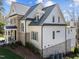 Beautiful two-story house with a blend of brick and siding, offering a blend of classic and modern design at 126 E Drewry Ln, Raleigh, NC 27609