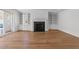 Elegant living room showcasing hardwood floors, custom built-ins, and access to the outdoor space at 126 E Drewry Ln, Raleigh, NC 27609