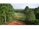Elevated view of property and surrounding golf course at 143 High Ridge Ln, Pittsboro, NC 27312