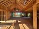 Open-concept interior framing with large windows offering scenic views at 143 High Ridge Ln, Pittsboro, NC 27312