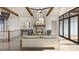 Spacious living room with stone fireplace and large windows at 143 High Ridge Ln, Pittsboro, NC 27312