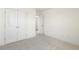 Bright bedroom with double doors leading to a spacious closet at 182 Ford Meadows Dr, Garner, NC 27529