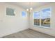 Bright breakfast area with hardwood floors and large windows offering a view at 182 Ford Meadows Dr, Garner, NC 27529