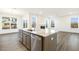 Open concept kitchen with granite island and stainless steel appliances at 182 Ford Meadows Dr, Garner, NC 27529