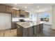 Modern kitchen with granite island and stainless steel appliances at 182 Ford Meadows Dr, Garner, NC 27529