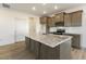 Modern kitchen with granite island and stainless steel appliances at 182 Ford Meadows Dr, Garner, NC 27529