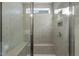 Walk-in shower with tile surround and built-in bench seat at 182 Ford Meadows Dr, Garner, NC 27529