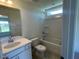 Bathroom with a shower-tub combo and single sink vanity at 23 Quail Pt Cir, Clayton, NC 27520
