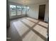 Dining area featuring hardwood floors, natural light, and water views at 23 Quail Pt Cir, Clayton, NC 27520