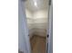 Walk-in pantry features adjustable wire shelving and a well-lit space for organization at 23 Quail Pt Cir, Clayton, NC 27520