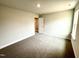 A bright carpeted bedroom with a window, offering a comfortable space with easy access to natural light at 328 Bishop Lane, Sanford, NC 27330