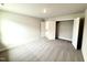 Spacious bedroom with an open closet and connecting door, featuring carpeted floors and neutral walls at 328 Bishop Lane, Sanford, NC 27330