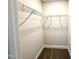 An organized closet with wire shelving and carpeted floor, maximizes storage and functionality at 328 Bishop Lane, Sanford, NC 27330