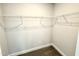 Walk-in closet with white shelving for efficient storage and organization at 328 Bishop Lane, Sanford, NC 27330
