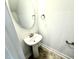 Convenient half-bathroom with pedestal sink and stylish fixtures at 328 Bishop Lane, Sanford, NC 27330