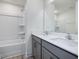 Bathroom with double vanity, tub, and mirror at 40 Lavender Ln, Clayton, NC 27520