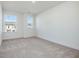 Bright bedroom featuring neutral walls and plush carpeting at 40 Lavender Ln, Clayton, NC 27520