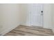 Side entryway with white door and vinyl flooring at 40 Lavender Ln, Clayton, NC 27520