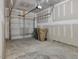 Unfinished garage with overhead door and ample space at 40 Lavender Ln, Clayton, NC 27520