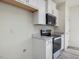 Modern kitchen with white cabinets, stainless steel appliances and quartz countertops at 40 Lavender Ln, Clayton, NC 27520