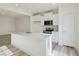 Modern kitchen with white cabinets, stainless steel appliances and an island at 40 Lavender Ln, Clayton, NC 27520
