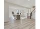 Modern kitchen with white cabinets, stainless steel appliances, and quartz countertops at 40 Lavender Ln, Clayton, NC 27520