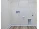 Laundry area with wire shelving and space for a washer and dryer at 40 Lavender Ln, Clayton, NC 27520
