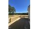 A spacious wooden deck overlooks a large green lawn at 52 Quail Point Cir, Clayton, NC 27520