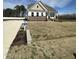 Charming two-story home with brick accents and a spacious front yard at 52 Quail Point Cir, Clayton, NC 27520