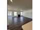 Open living room with fireplace and hardwood floors at 52 Quail Point Cir, Clayton, NC 27520