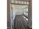 Bright office space with many windows and dark wood floors at 52 Quail Point Cir, Clayton, NC 27520