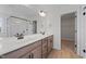 Modern bathroom with double vanity, walk-in shower, and a large closet at 1019 Gibson House Dr, Burlington, NC 27215