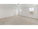 Spacious bedroom with carpet flooring and two large windows at 1019 Gibson House Dr, Burlington, NC 27215
