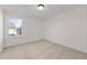 Bright bedroom with carpet, large window, and neutral walls at 1019 Gibson House Dr, Burlington, NC 27215